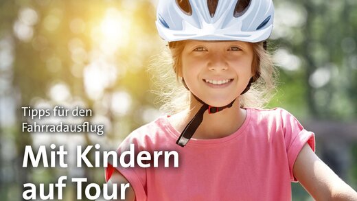 Titelbild DSH-Zeitschrift Kind auf dem Fahrrad mit Fahrradhelm